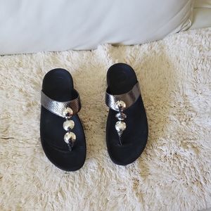 A pair of used size 8 fitflop